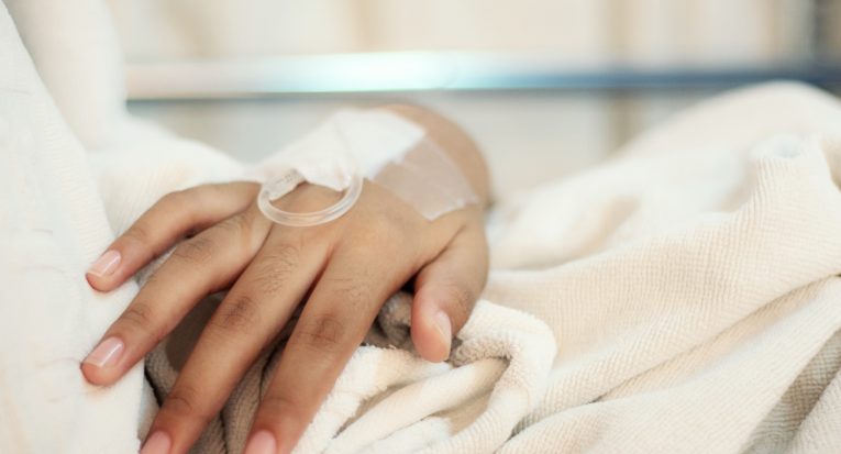 Hand of the patient in the hospital.